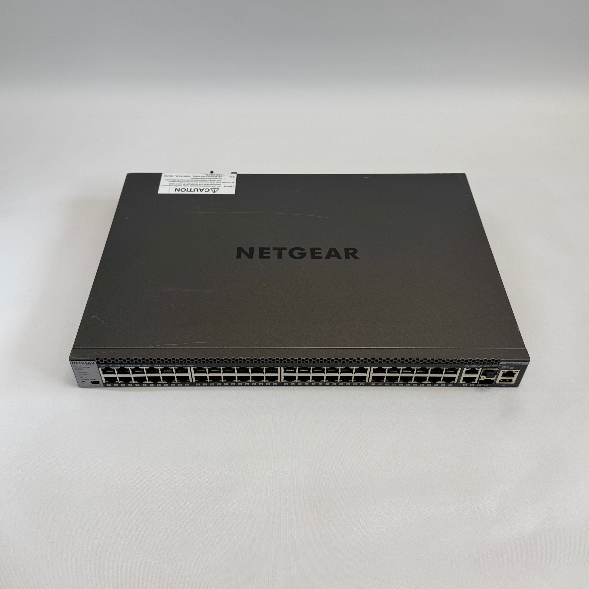 NETGEAR M4300-52G GSM4352S stackable Layer 3 fully managed Gigabit switch with 48 ports and 4 10G uplinks for ProAV-over-IP and enterprise networks