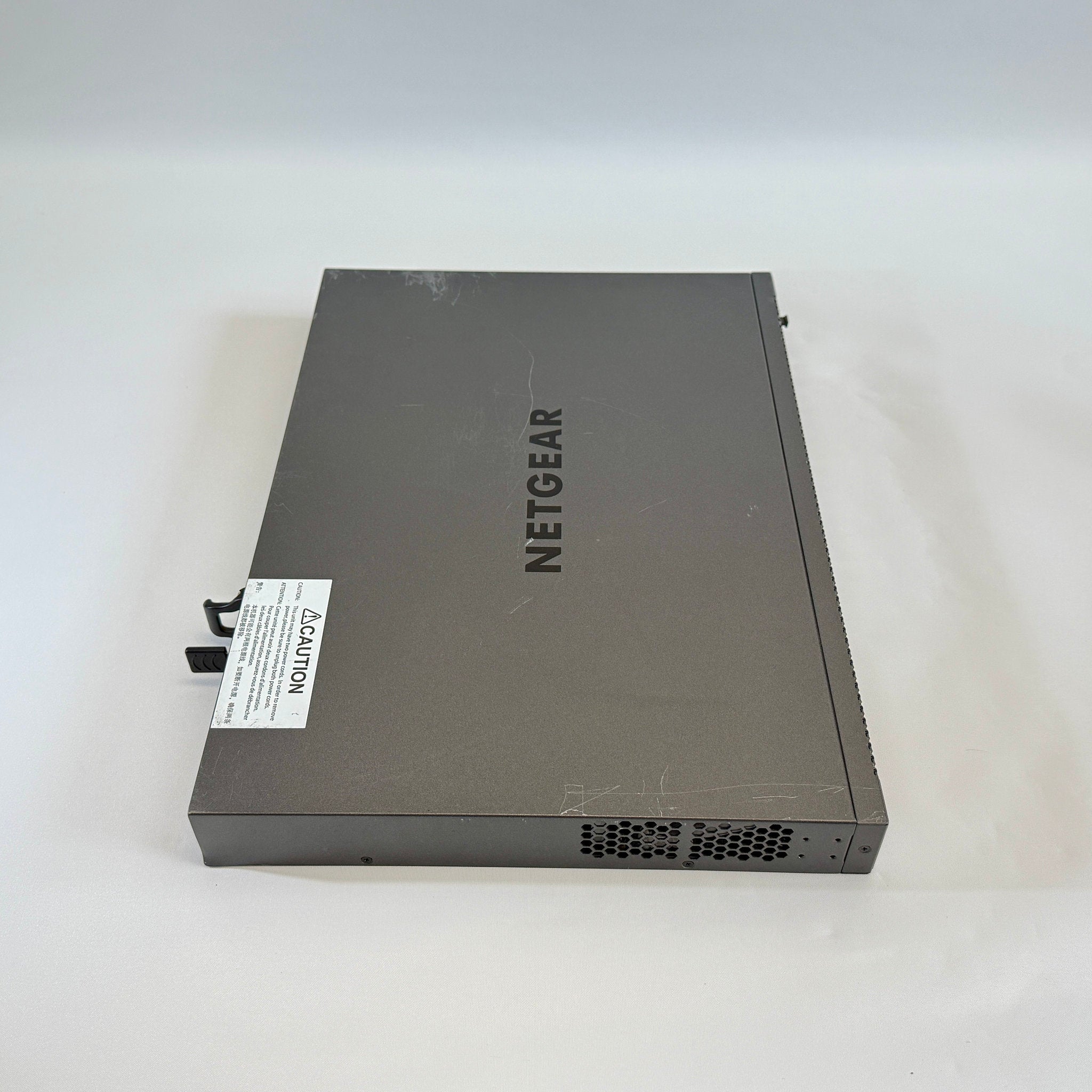 NETGEAR M4300-52G GSM4352S stackable Layer 3 fully managed Gigabit switch with 48 ports and 4 10G uplinks for ProAV-over-IP and enterprise networks