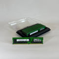 Front view of an SK Hynix 32GB 2Rx4 PC4-32AA DDR4 Registered ECC server memory stick. The green PCB holds the black memory chips and a clear white manufacturer label displaying the part number HMA84GR7DJR4N-XN and specifications.